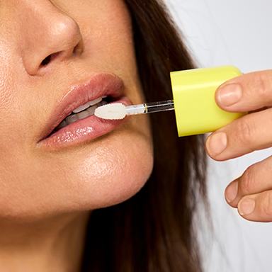 FROSTd lip oil in use
